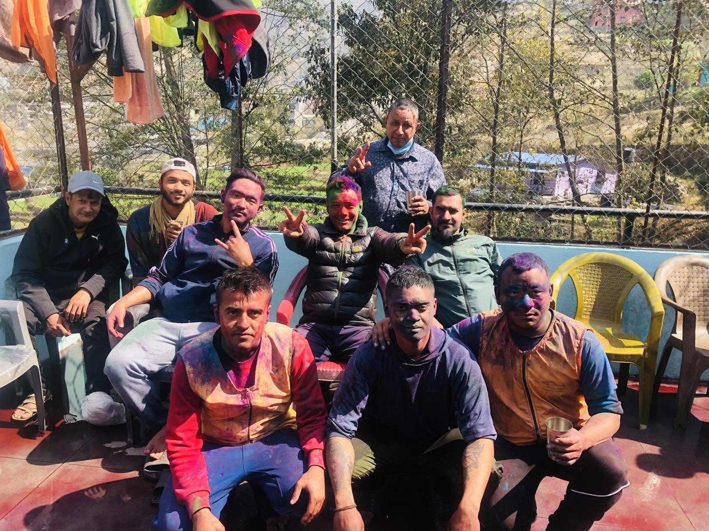 Residents gathering during a Holi celebration