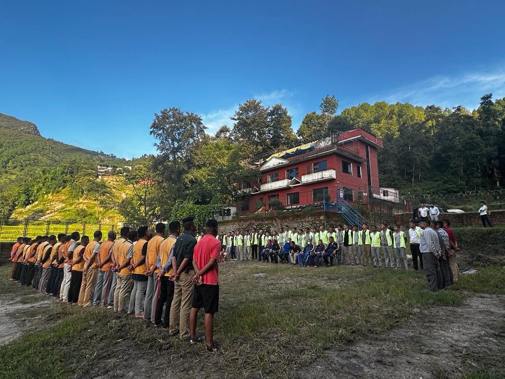 Residents lined up in the Way of Living campus yard